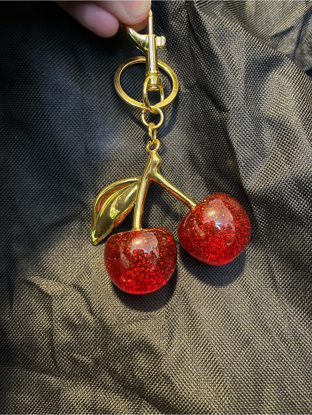 Sparkling Red Cherry Keychain with Gold Accents